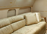 Interior view of a Boeing 757 with electric window shades 